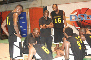 Islanders coach Lati Erifolami giving instructions to his   boys during a match