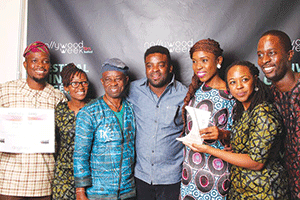 Kelani (3rd left) with some members of cast at the festival