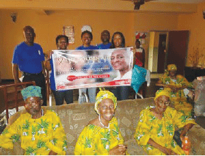 Foregorund: inmates of Vafiero Foundation, an old people's home in Ikeja, Lagos