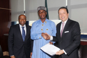 Transportation Minister Chibuike Rotimi Amaechi flanked by Director, Decentralized Corporation, UNITAR Alex Mejia (right) and Country Director/Representative, Nigeria Office Lawrence Boms in Abuja