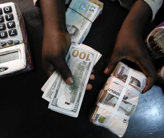 Naira exchanges N900 to a Dollar at parallel market