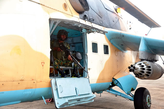 A NAF official in a plane