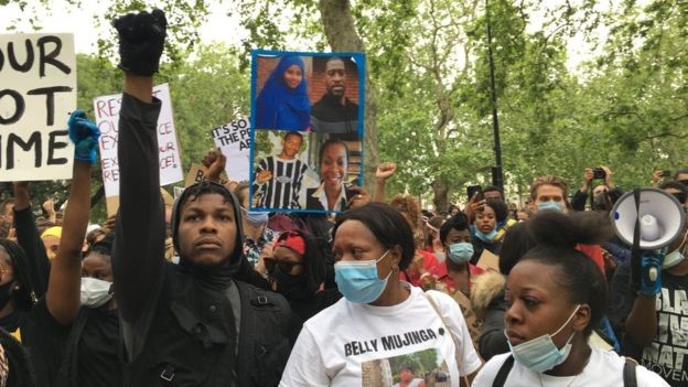 Police clash with protesters outside Downing Street