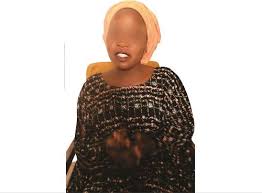 This image has an empty alt attribute; its file name is Gombe-woman-who-says-husbands-are-scarce.jpg