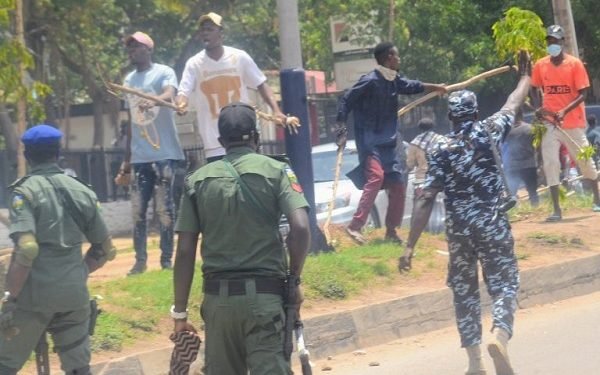 Intimidation-ballot-box. Police-engaging