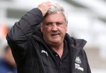 Steve-Bruce puts hand on his head