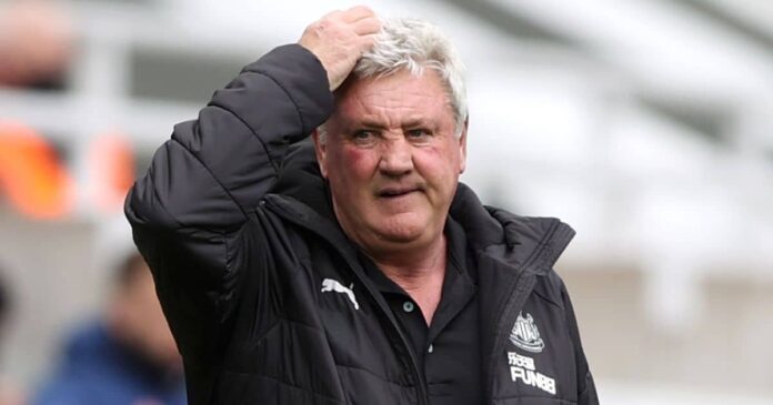 Steve-Bruce puts hand on his head