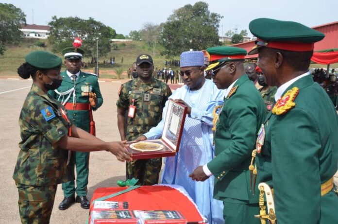 Marwa. Marwa -(m)-presenting-the 'Marwa-Award'-to-Lt-OR-Oyetunde -(l)-while- the-Chief-of-Army-Staff- Lt- Gen-Farouk-Yahaya-(2nd -r)-and-Commander-Infantry-Corps-Major-Gen-VO-Ezugwu-(r)-watch-in- admiration.