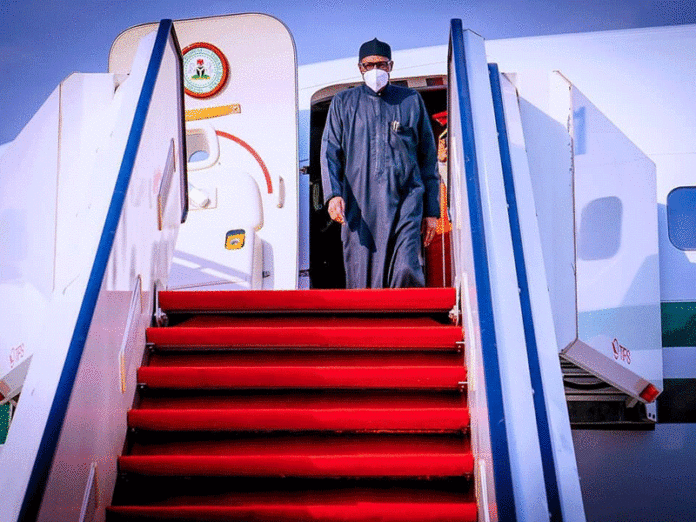 BREAKING: Buhari returns from London