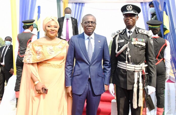 Lagos State Governor, Mr. Babajide Sanwo-Olu flanked by the immediate past Lagos Commissioner of Police, Assistant Inspector General (AIG) Hakeem Odumosu (right) and his wife (left), during a Farewell/Pull-out Parade in his honour at Police College, Ikeja, on Tuesday, January 25, 2022