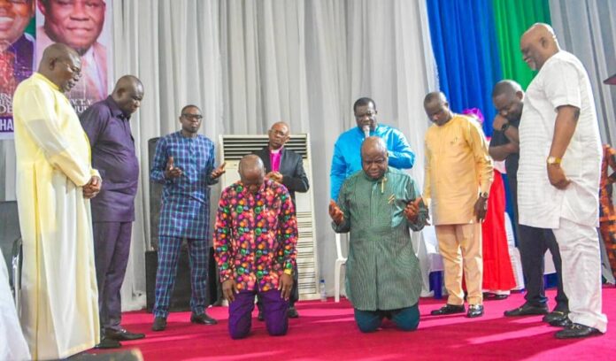 Diri-tasks. Christian-leaders-praying-for-Diri-and-his-deputy