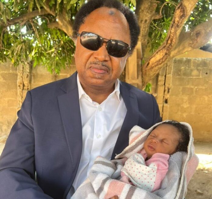 Shehu Sani and adopted baby