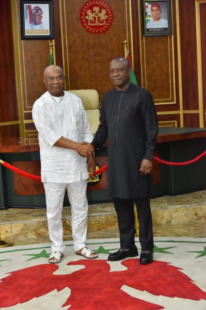 Eze Anaba (right) with the governor of Imo State, Hope Uzodimma, after he was elected President of the Nigerian Guild of Editors