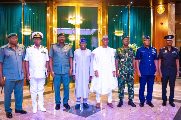 Tinubu-decorates. Tinubu-and-security-chiefs