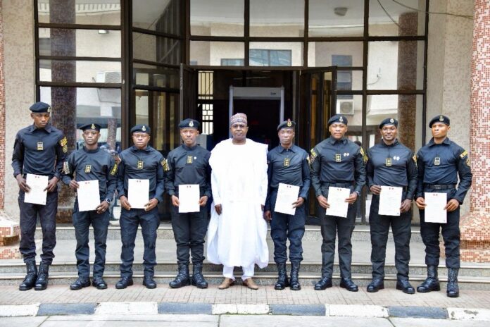 8-NDLEA-officers. Marwa-and-the-officers