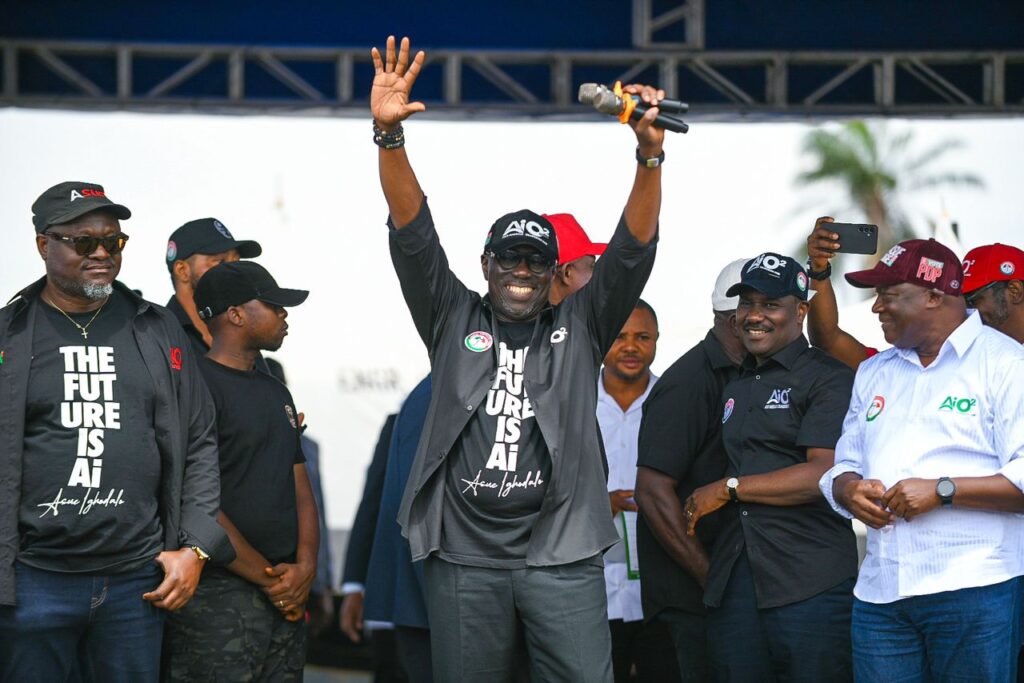 Asue Ighodalo acknowledging cheers from supporters at campaign rally in Uromi, Esan North East LGA, Edo State