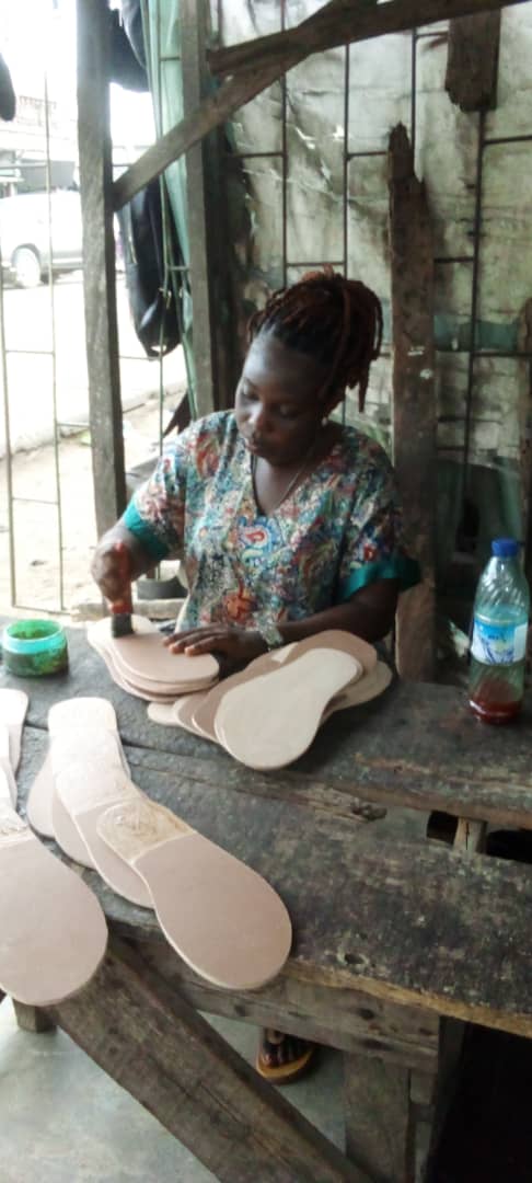 Adaaku-the-shoemaking-prodigy. Adaaku-at-work