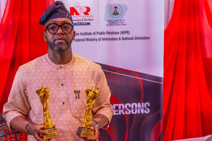 Olufemi Soneye receiving NIPR award